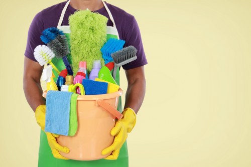 Professional cleaners carrying out end of tenancy cleaning in a London flat