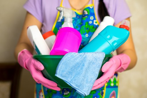Cleaner preparing a London home with practical local cleaning service focus