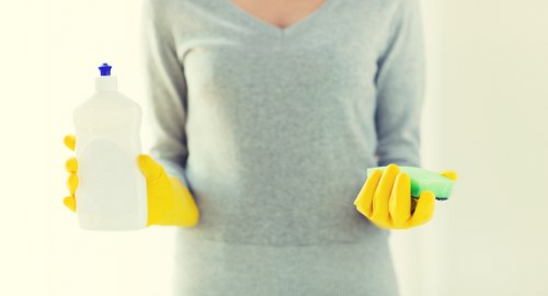 Team member completing a safe end of tenancy cleaning checklist